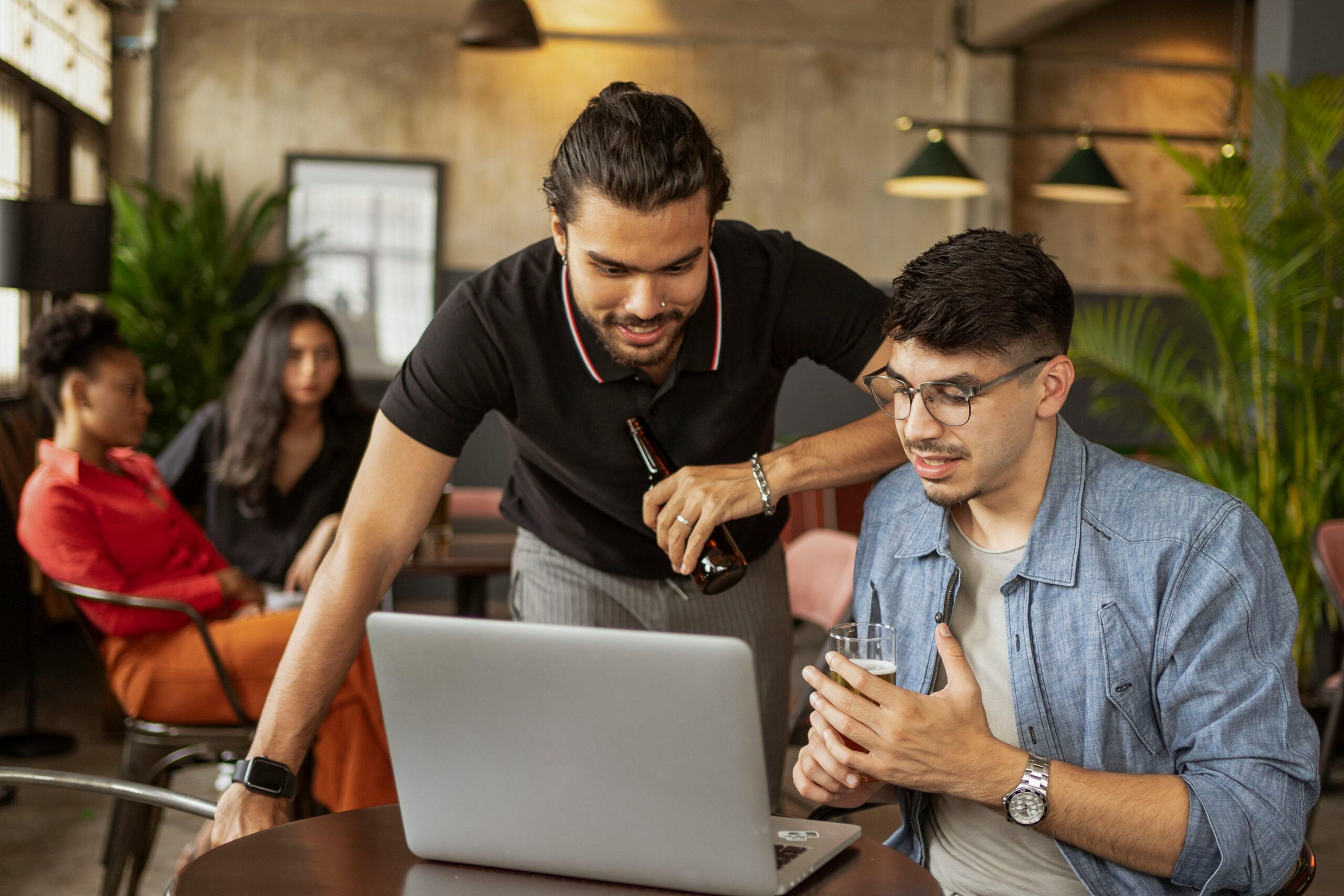 Men Looking at Laptop